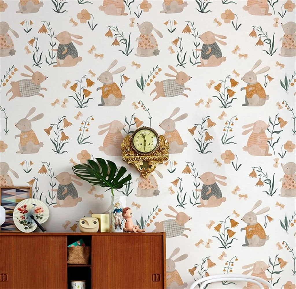 Close-up of bunny mural showing illustrated rabbits, floral accents, soft pastel colours, and high-quality wallpaper texture.