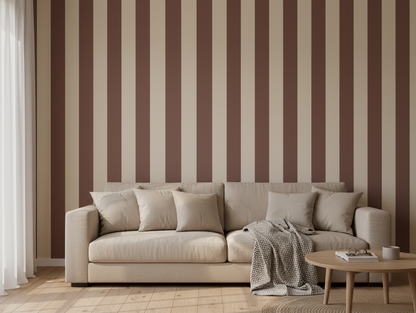 Beige sofa against a wall with brown and beige vertical stripes