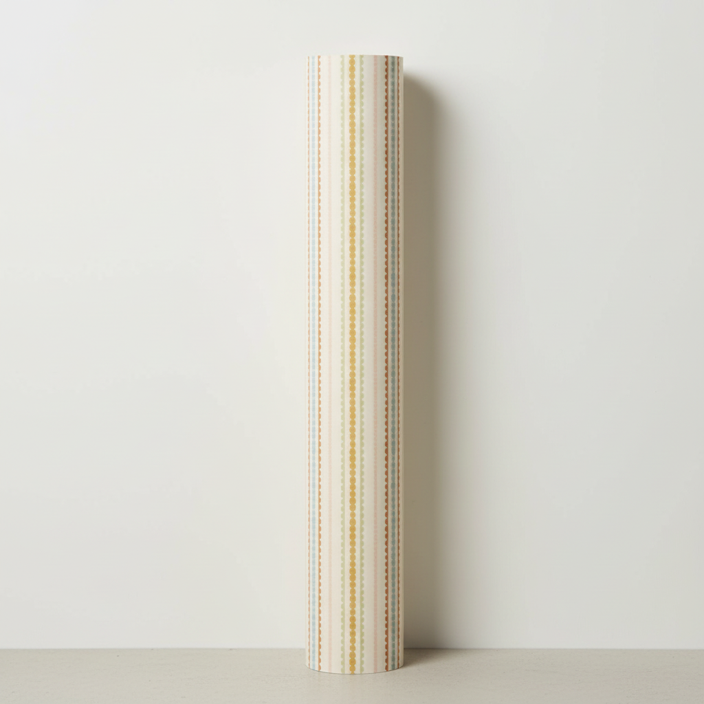 Roll of striped wrapping paper on a light gray background