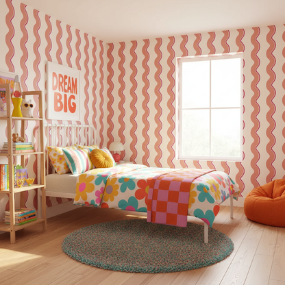 Children's bedroom with pink wavy wallpaper, colorful bedding, and a 'Dream Big' sign.