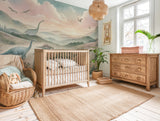 Pastel peaks dinosaur mural wallpaper for a nursery