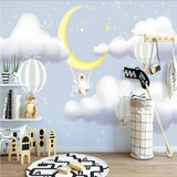 Baby bear in the night sky mural wallpaper for a nursery