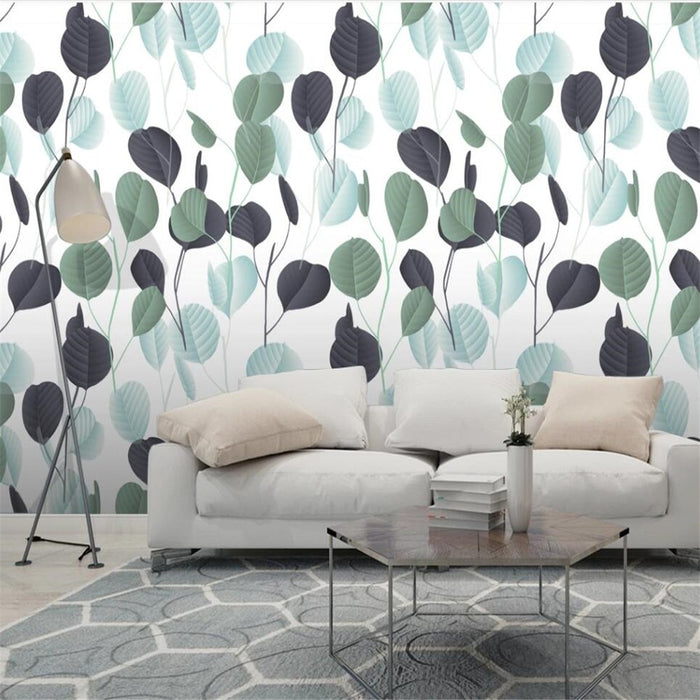 Tropical green leaves mural wallpaper for a living room