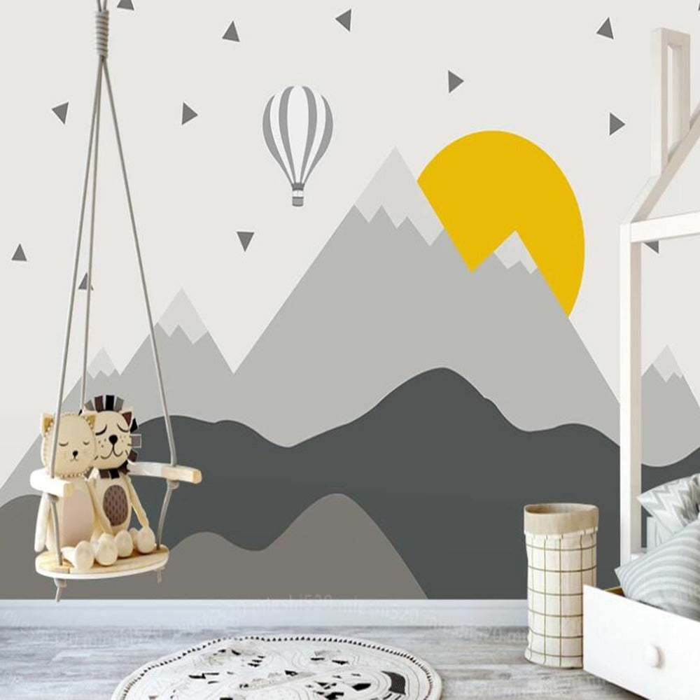 Geometric sunset and grey mountain skies mural wallpaper for a living room