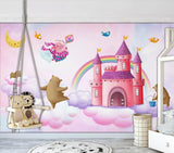 Pink rainbow princess castle mural wallpaper in a girls' bedroom – castle, flying pig and dancing bears