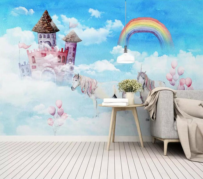 Blue unicorn and rainbow castle mural wallpaper in a child's bedroom